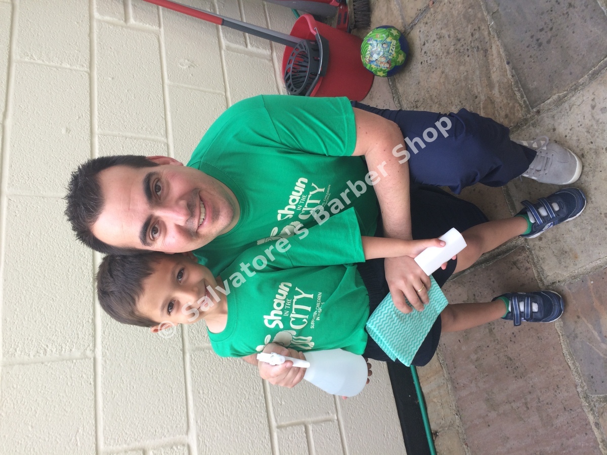 Salvatore and his son volunteering with Shaun in the City, Bristol Children's Hospital charity